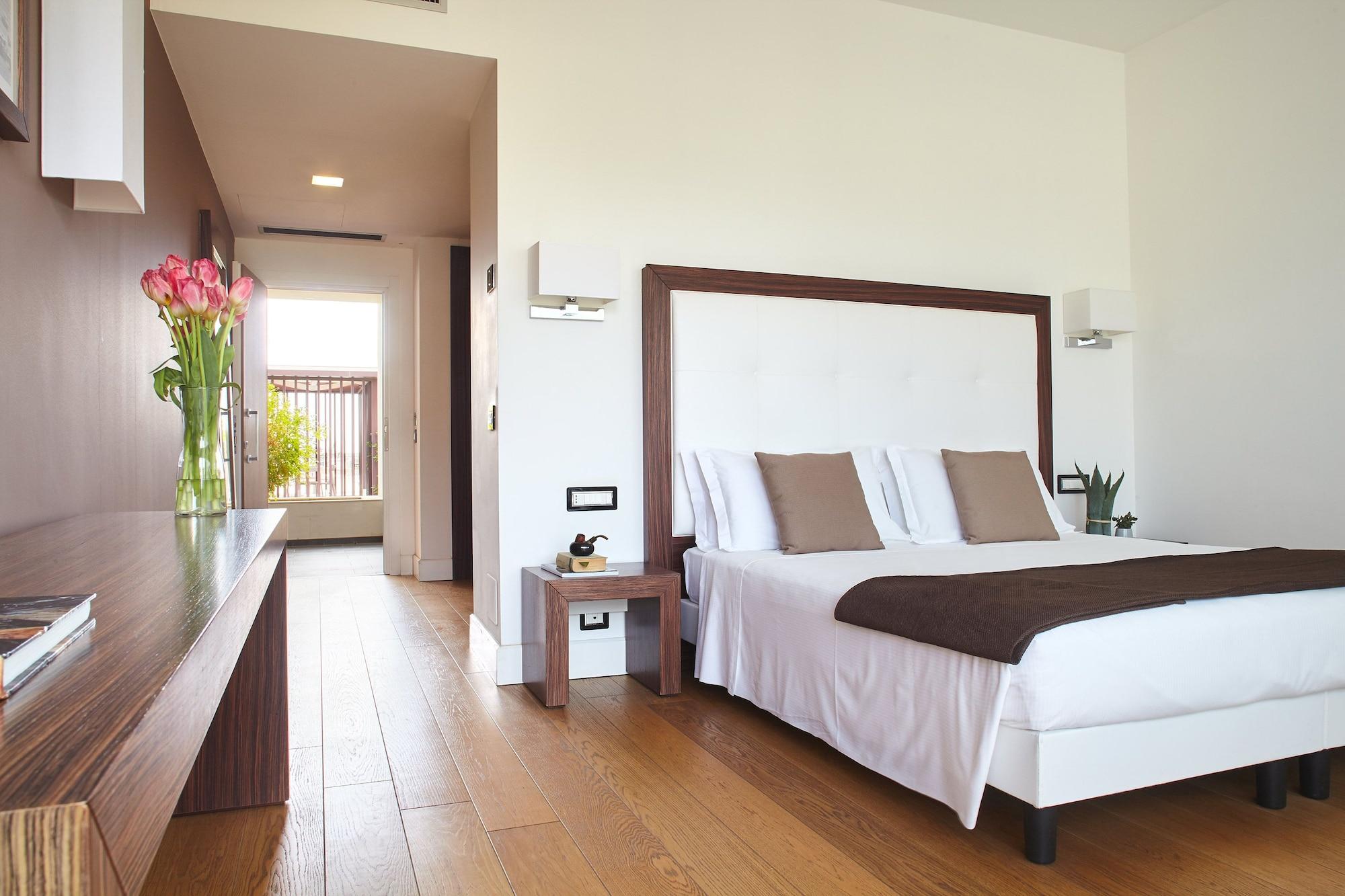 Borgo Di Luce I Monasteri Golf Resort & Spa Syracuse Extérieur photo A bedroom at the hotel