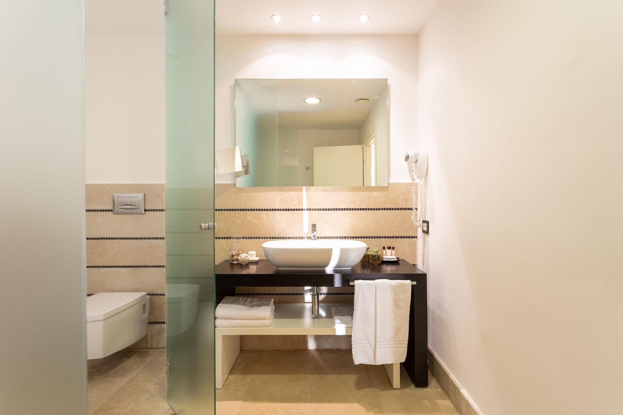 Borgo Di Luce I Monasteri Golf Resort & Spa Syracuse Extérieur photo Bathroom