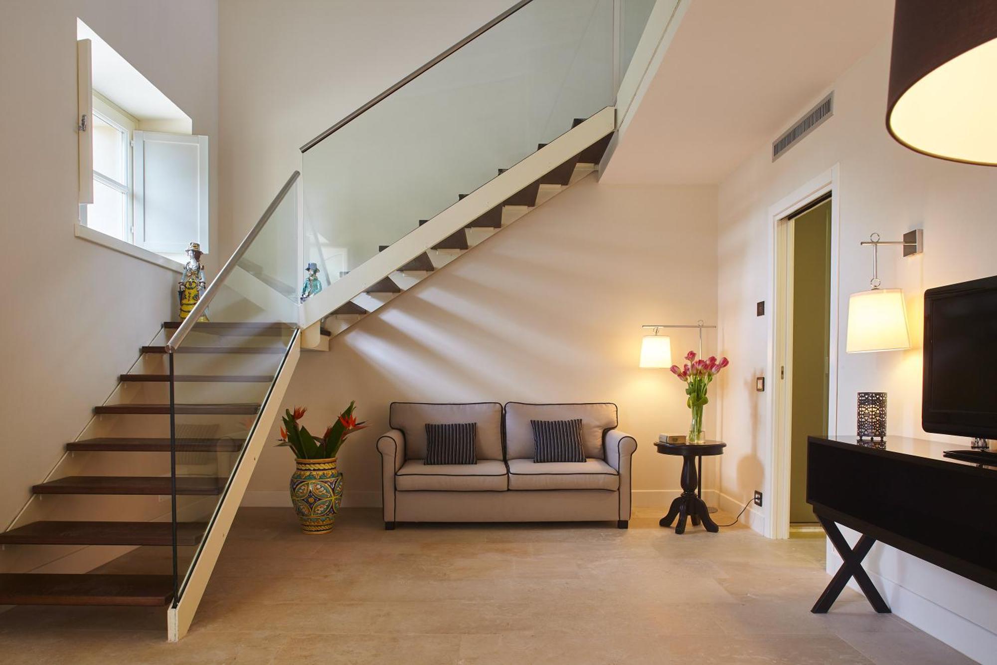 Borgo Di Luce I Monasteri Golf Resort & Spa Syracuse Extérieur photo A modern staircase